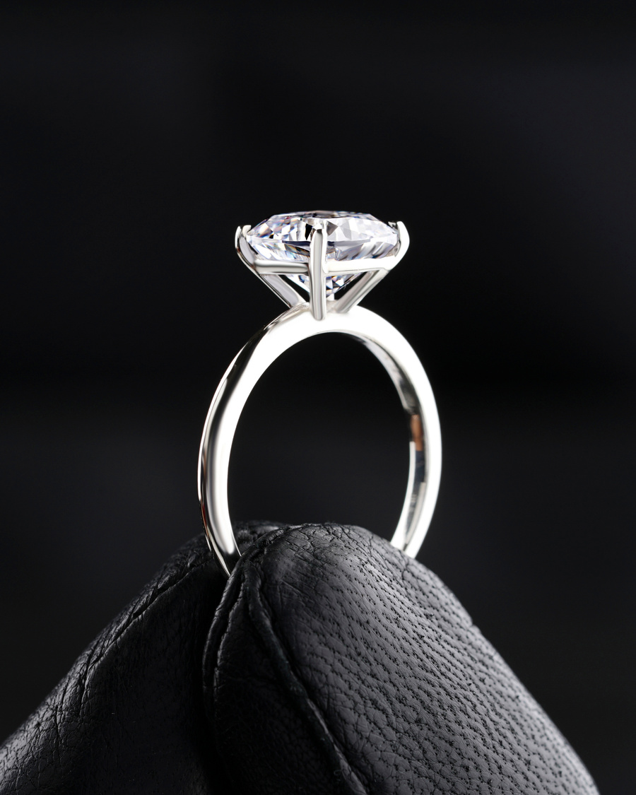 Silver Ring on Black Textile